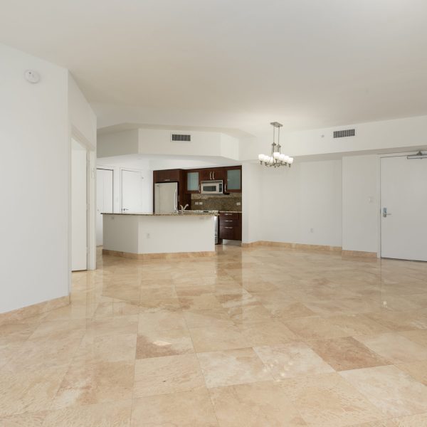 Open Vacant home with travertine stone floors flooring